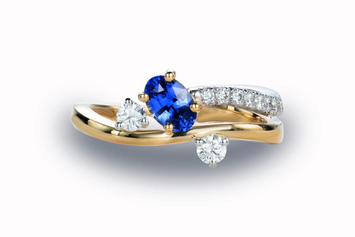 Bicolor Gouden ring gezet met blauwe saffier en natuurlijke diamant